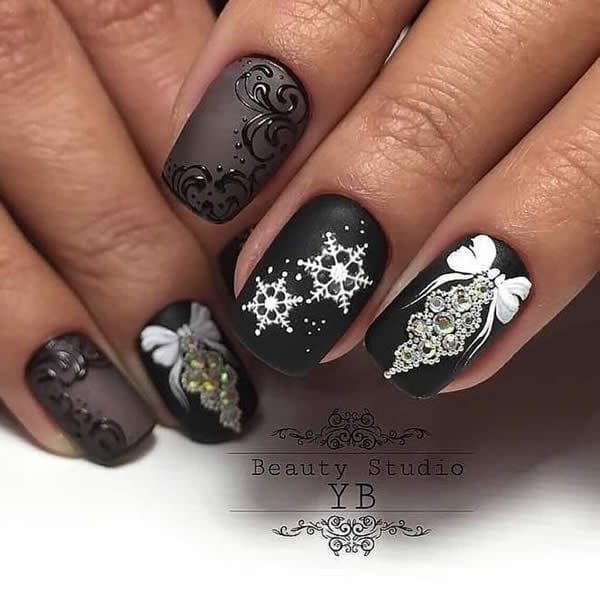 unhas decoradas com flocos de neve